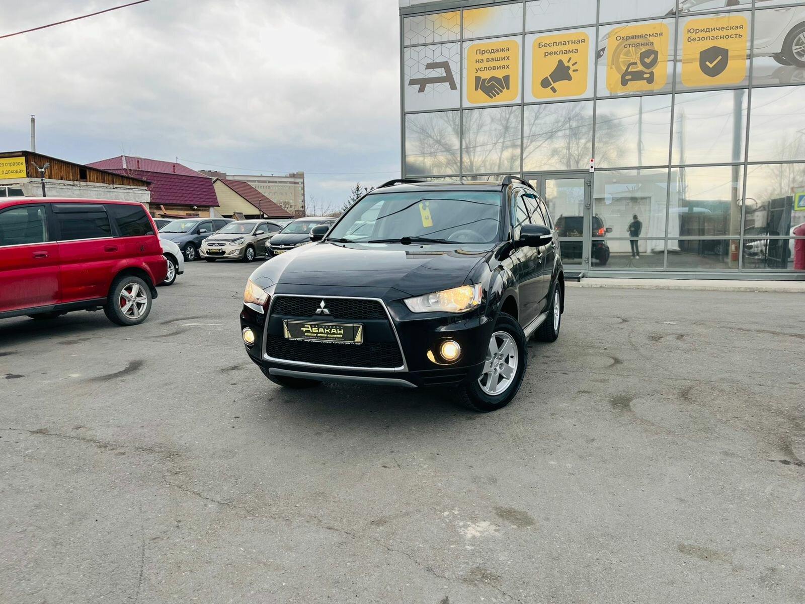 Mitsubishi Outlander — фото 1